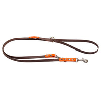 Dunkelbraune Bicolor-Verlängerungsleine aus Biothane mit Besätzen in Neon-Orange, Karabiner und O-Ring