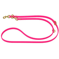 Verstellbare Verlängerungsleine aus Biothane in Neonpink mit zwei Karabinern und O-Ringen in Messing