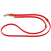 Verstellbare Verlängerungsleine aus Biothane in Rot, zwei Karabiner und O-Ringe in Messing