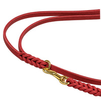 Detail: Karabiner im Messingring eingehängt, geflochtene Enden der Umhängeleine in Rot